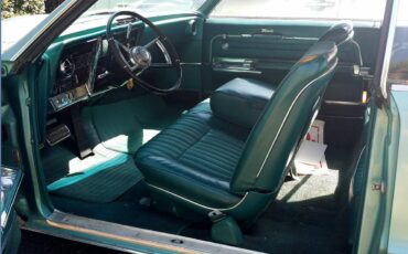 Oldsmobile-toronado-1966-green-12