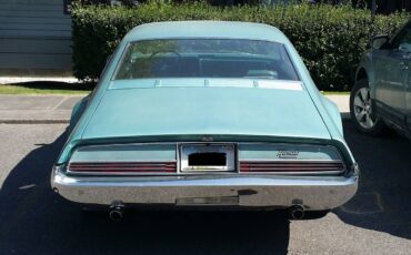 Oldsmobile-toronado-1966-green-3