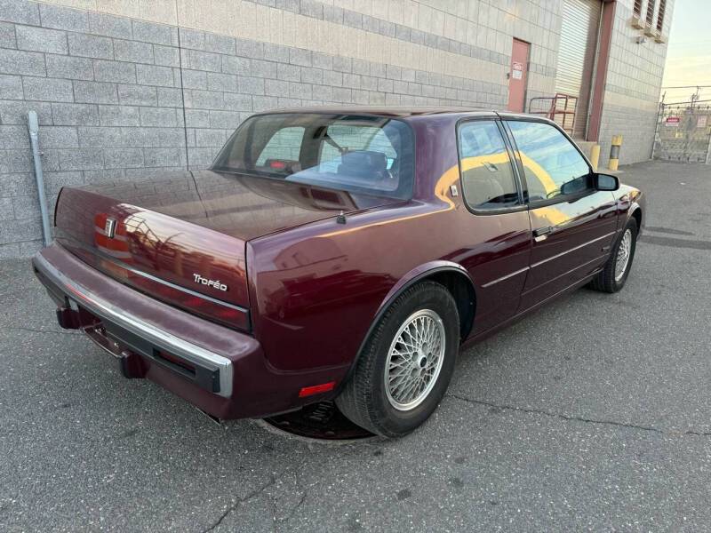 Oldsmobile-toronado-1989-purple-11