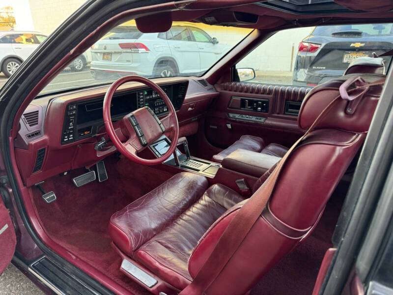 Oldsmobile-toronado-1989-purple-14
