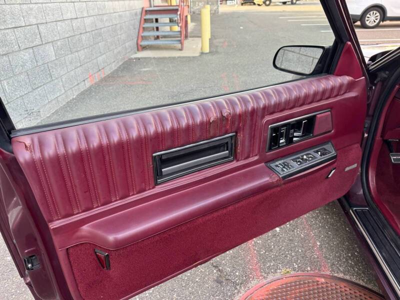 Oldsmobile-toronado-1989-purple-19