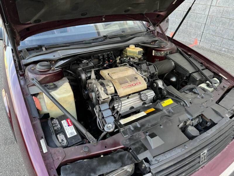 Oldsmobile-toronado-1989-purple-3