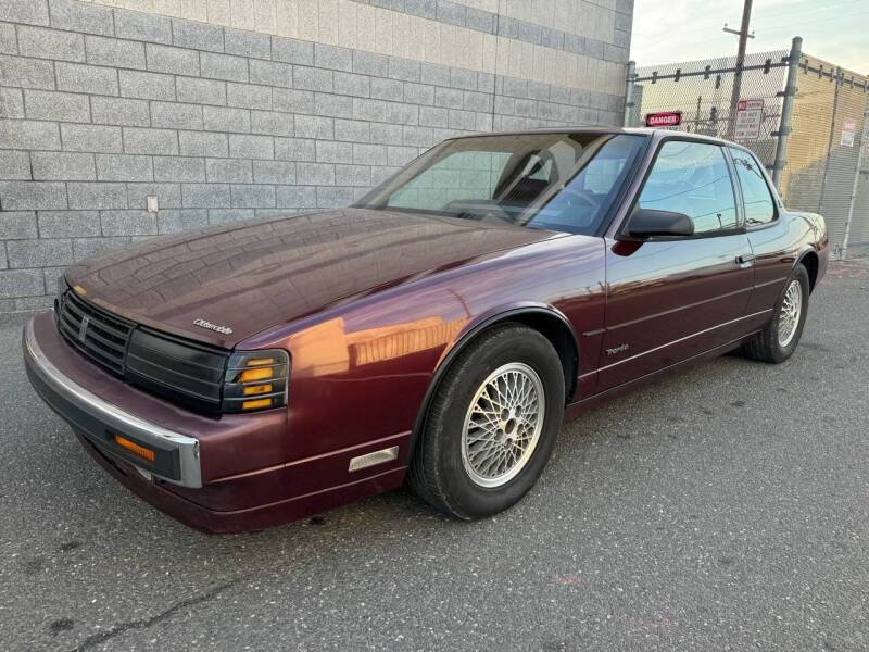 Oldsmobile-toronado-1989-purple-4