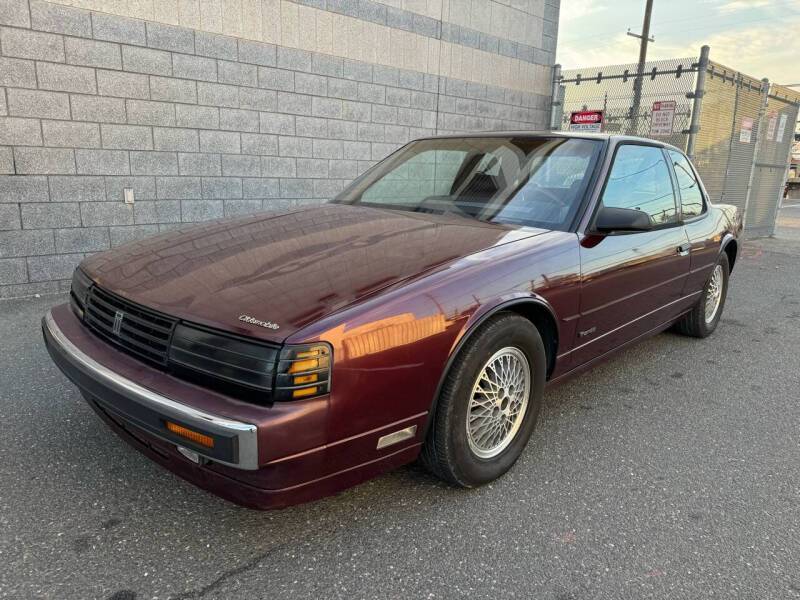 Oldsmobile-toronado-1989-purple-6