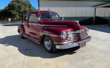 Plymouth-2-dr-coupe-1942-Maroon-Tan-2