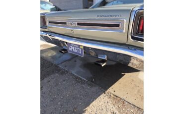 Plymouth-Gtx-1969-Sage-green-gold-Black-white-blue-8