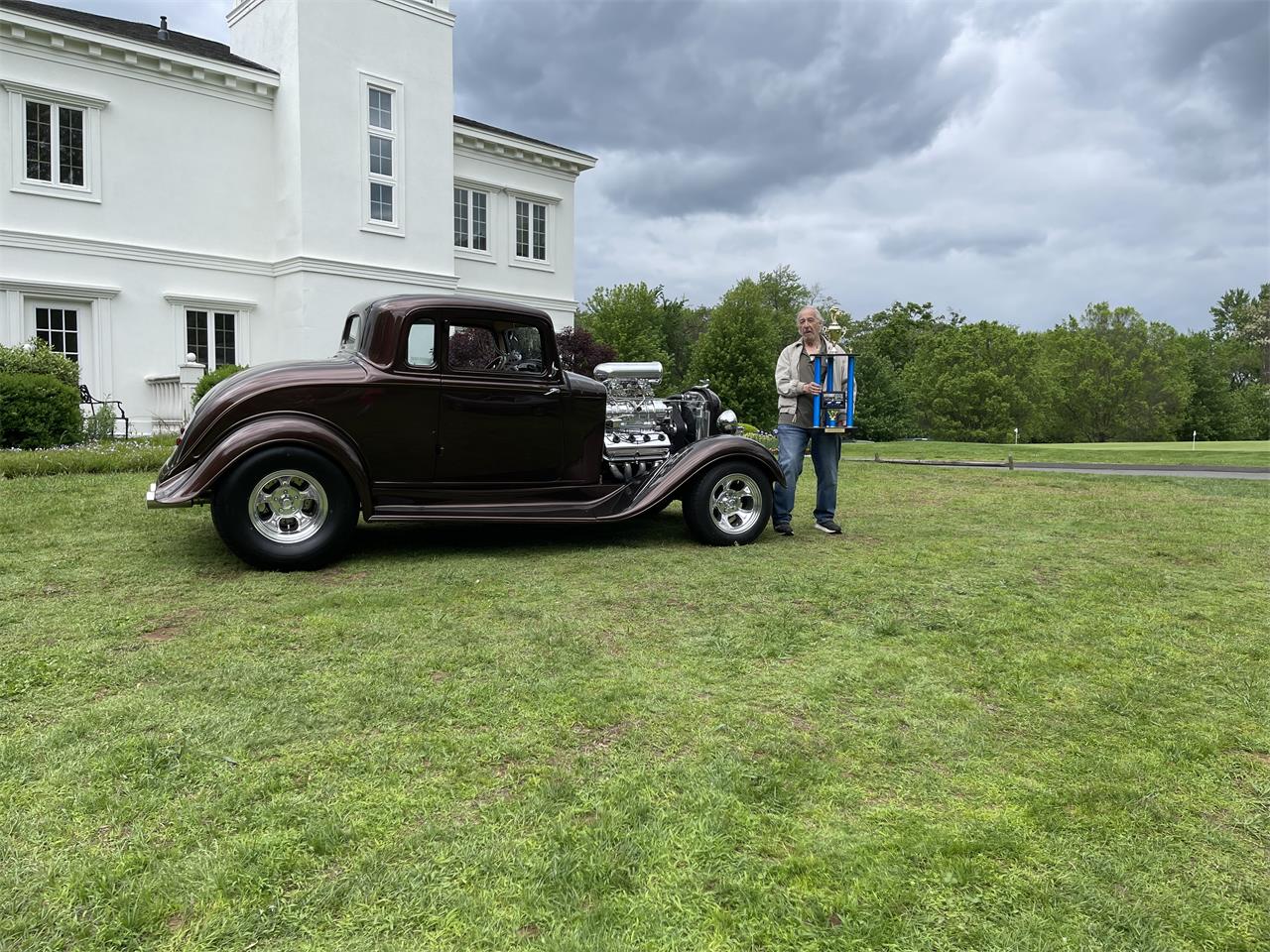 Plymouth-Pd-deluxe-1933-Root-Beer-Metallic-Tan-1