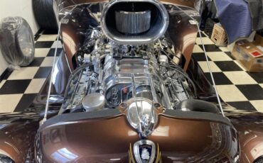 Plymouth-Pd-deluxe-1933-Root-Beer-Metallic-Tan-10