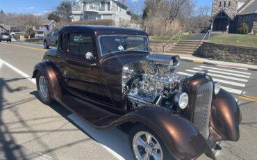 Plymouth-Pd-deluxe-1933-Root-Beer-Metallic-Tan-13