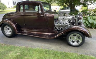Plymouth-Pd-deluxe-1933-Root-Beer-Metallic-Tan-2
