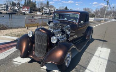 Plymouth-Pd-deluxe-1933-Root-Beer-Metallic-Tan-5