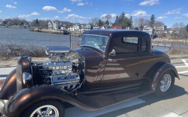 Plymouth-Pd-deluxe-1933-Root-Beer-Metallic-Tan-6