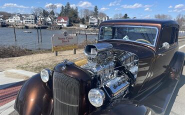 Plymouth-Pd-deluxe-1933-Root-Beer-Metallic-Tan-8