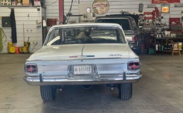 Plymouth-Sport-fury-1963-White-Black-1