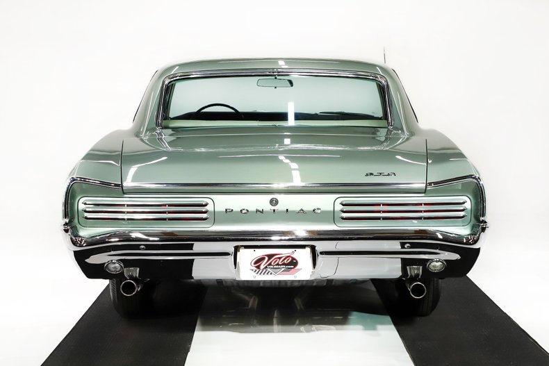 Pontiac-Gto-1966-Palmetto-Green-Pearl-White-34