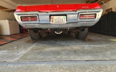 Pontiac-Gto-1968-Red-with-white-top-White-and-black-18