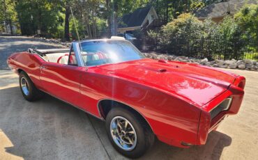 Pontiac-Gto-1968-Red-with-white-top-White-and-black-3