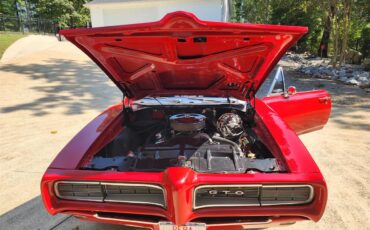 Pontiac-Gto-1968-Red-with-white-top-White-and-black-5