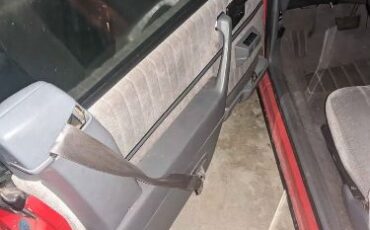 Pontiac-Sunbird-1991-Red-Gray-2