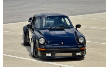 Porsche-911-1975-Black-Black-21