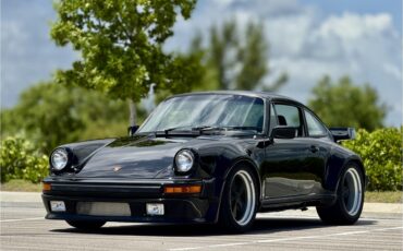 Porsche-911-1975-Black-Black-83