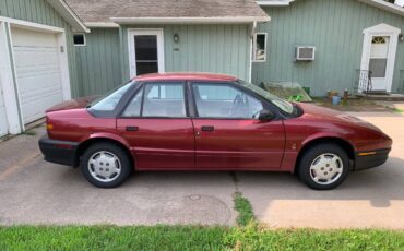 Saturn-sl1-sedan-1995-red-1