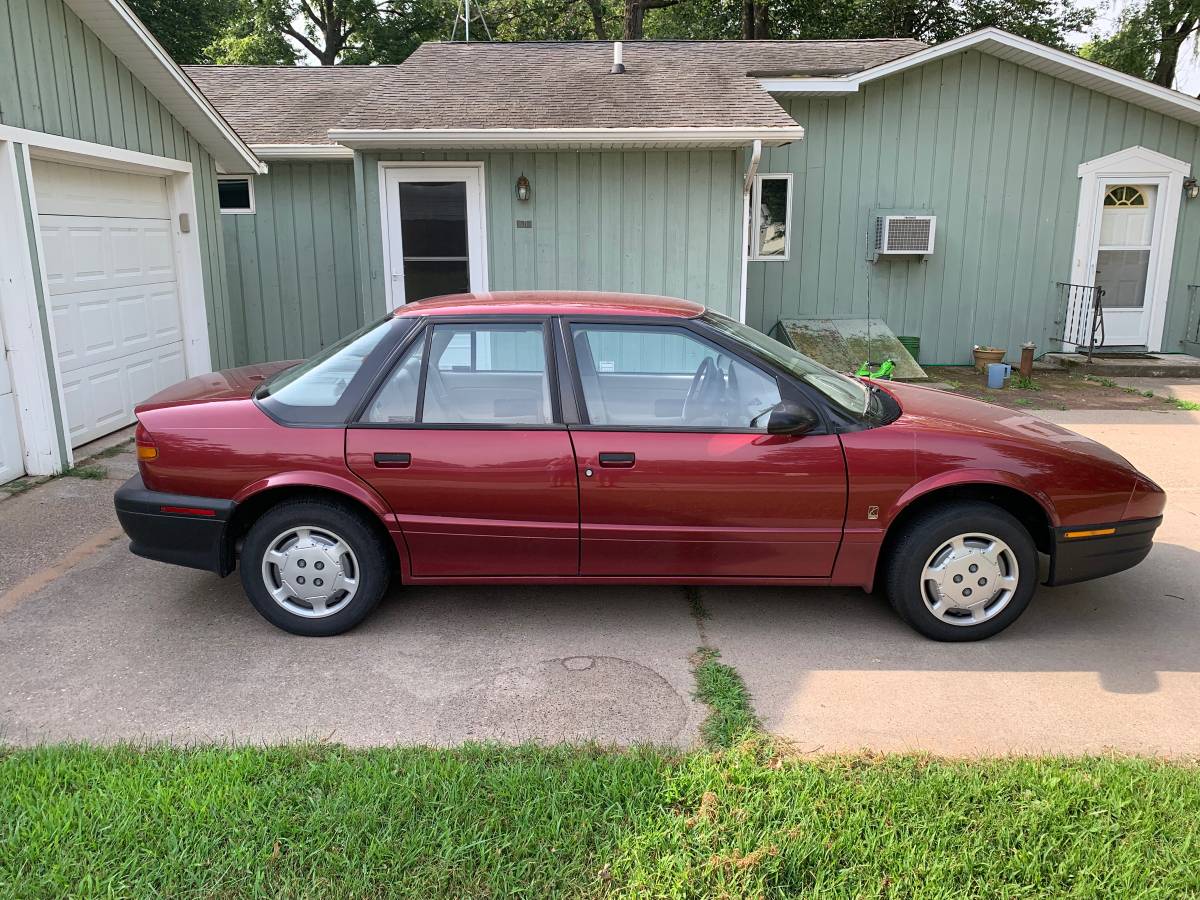 Saturn-sl1-sedan-1995-red-1