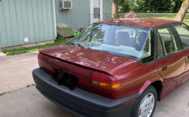 Saturn-sl1-sedan-1995-red-2