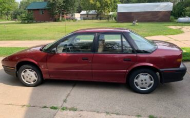 Saturn-sl1-sedan-1995-red-3