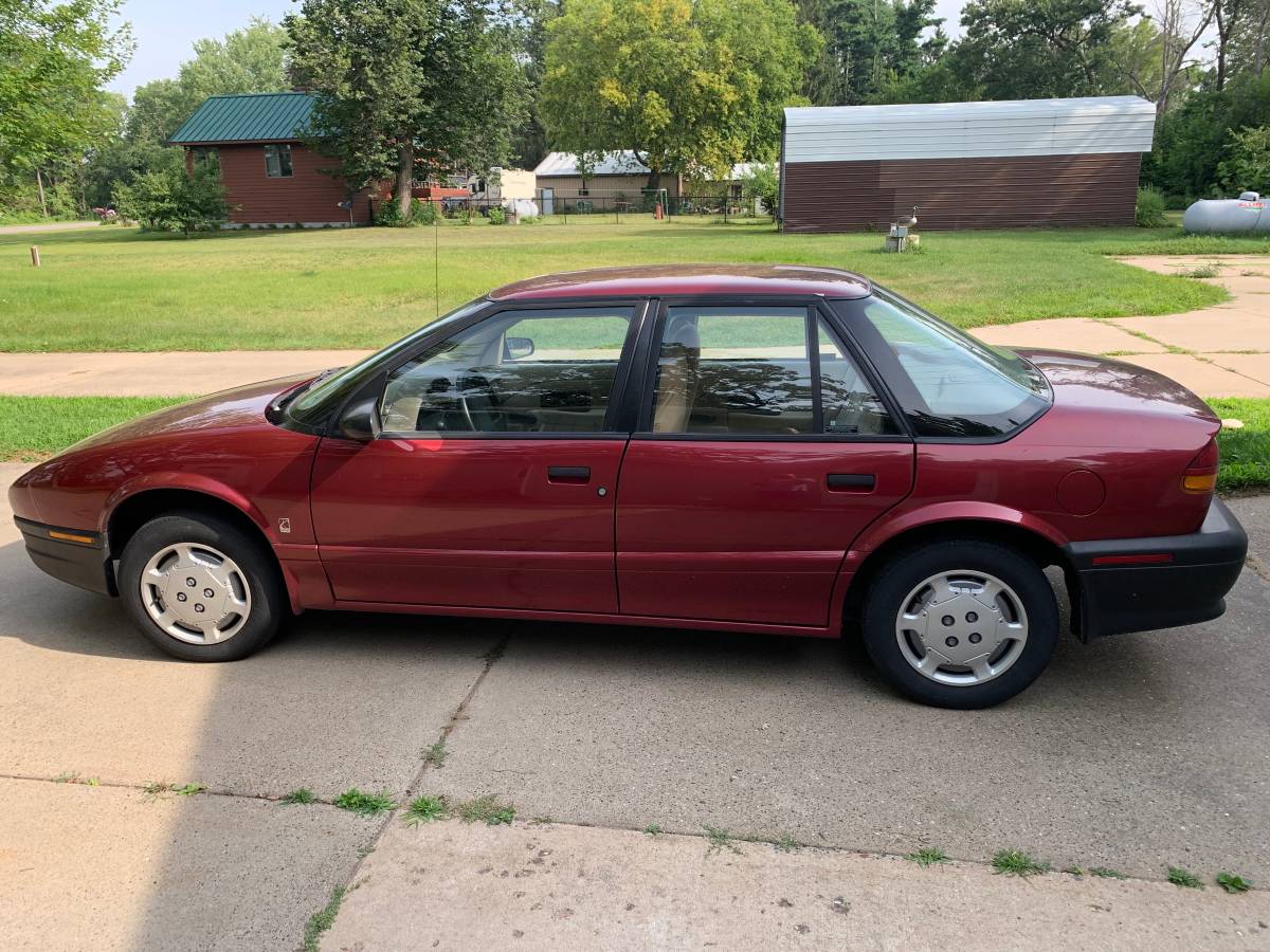 Saturn-sl1-sedan-1995-red-3