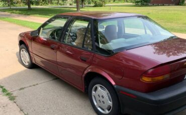 Saturn-sl1-sedan-1995-red-4