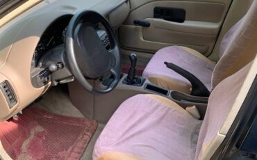 Saturn-sl1-sedan-1995-red-5