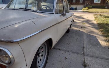 Studebaker-Cruiser-1963-White-Brown-2