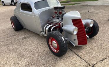Studebaker-Dictator-1937-Silver-Red-10
