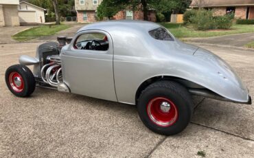 Studebaker-Dictator-1937-Silver-Red-19