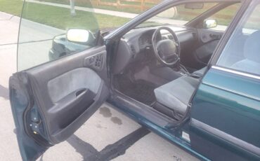 Subaru-legacy-l-wagon-1995-green-8