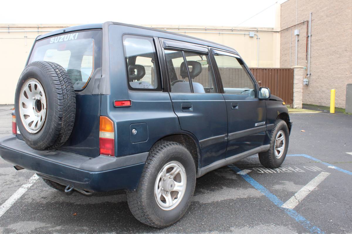 Suzuki-sidekick-1995-green-1