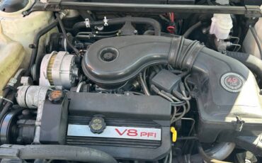 Touring-sedan-de-ville-1993-white-10