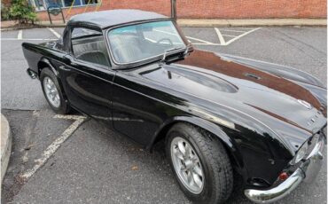 Triumph-Tr4-1964-New-Gloss-Black-pain-Light-grey-leather-13