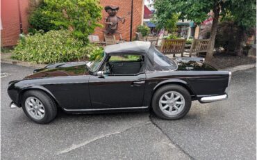 Triumph-Tr4-1964-New-Gloss-Black-pain-Light-grey-leather-21
