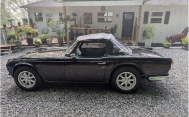 Triumph-Tr4-1964-New-Gloss-Black-pain-Light-grey-leather-22