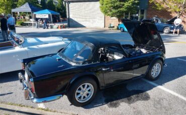 Triumph-Tr4-1964-New-Gloss-Black-pain-Light-grey-leather-42