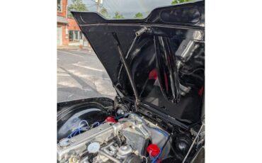 Triumph-Tr4-1964-New-Gloss-Black-pain-Light-grey-leather-43