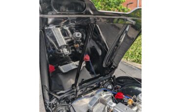 Triumph-Tr4-1964-New-Gloss-Black-pain-Light-grey-leather-51