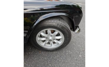 Triumph-Tr4-1964-New-Gloss-Black-pain-Light-grey-leather-53