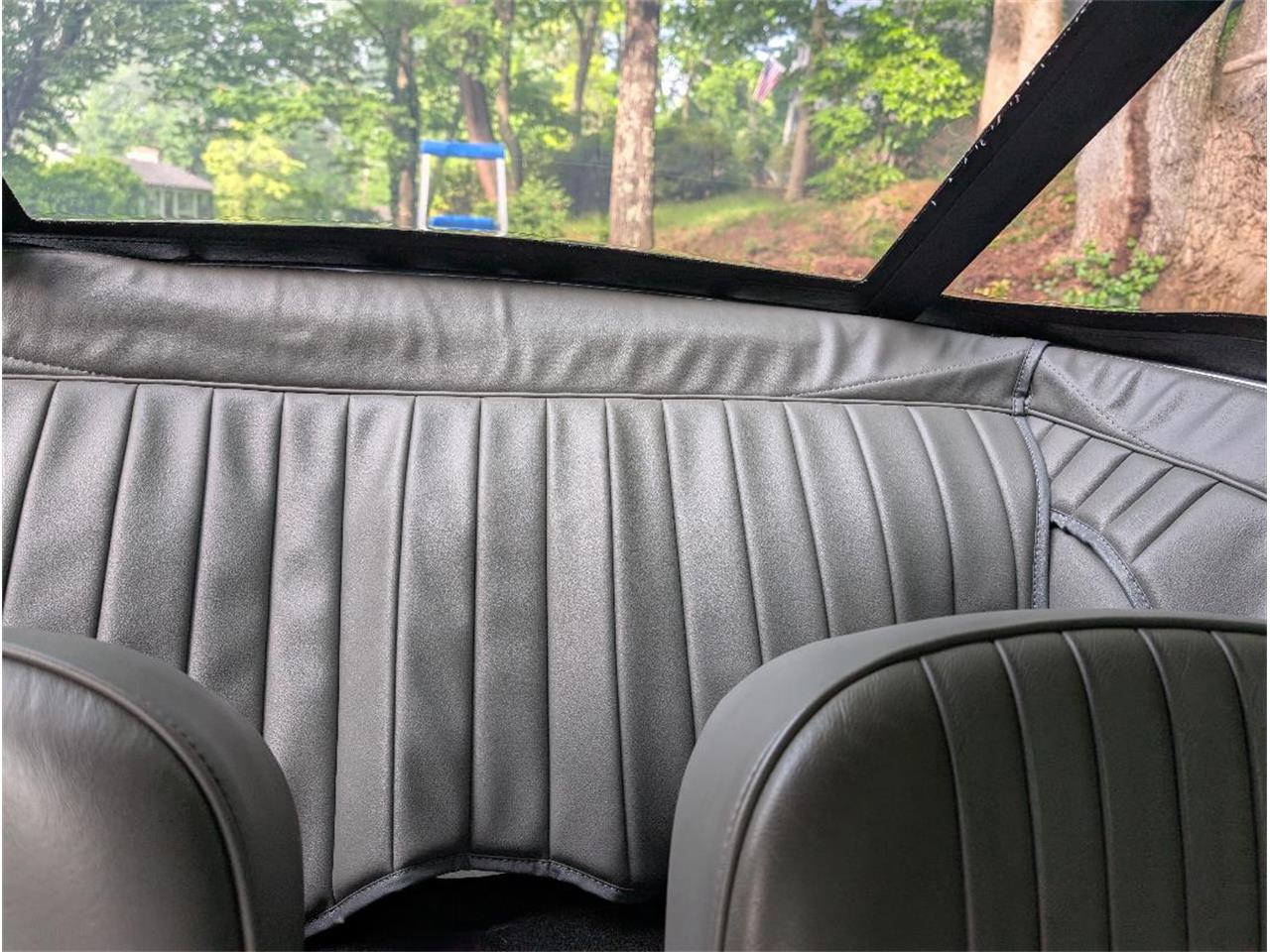 Triumph-Tr4-1964-New-Gloss-Black-pain-Light-grey-leather-69