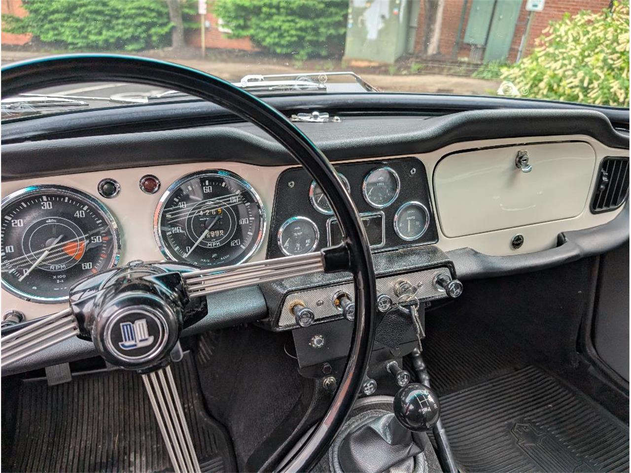 Triumph-Tr4-1964-New-Gloss-Black-pain-Light-grey-leather-70