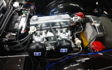 Triumph-Tr4-1964-New-Gloss-Black-pain-Light-grey-leather-88