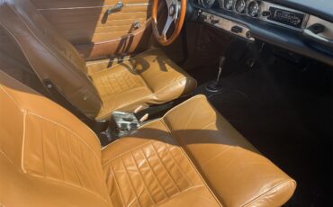 Volvo-1800s-1968-Green-Tan-3
