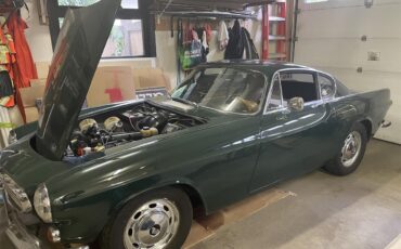 Volvo-1800s-1968-Green-Tan-4